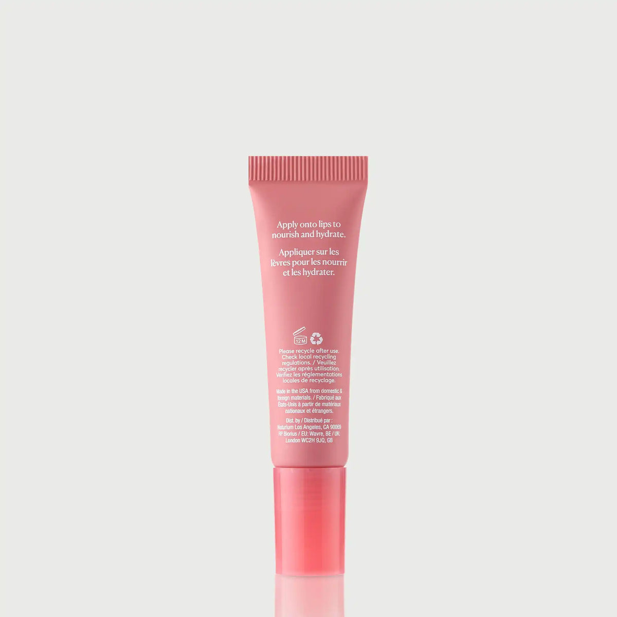 Phyto-Glow Lip Balm — NATR-60067_PhytoGlow_Petal_primary_capon_back-bonebkgd.webp