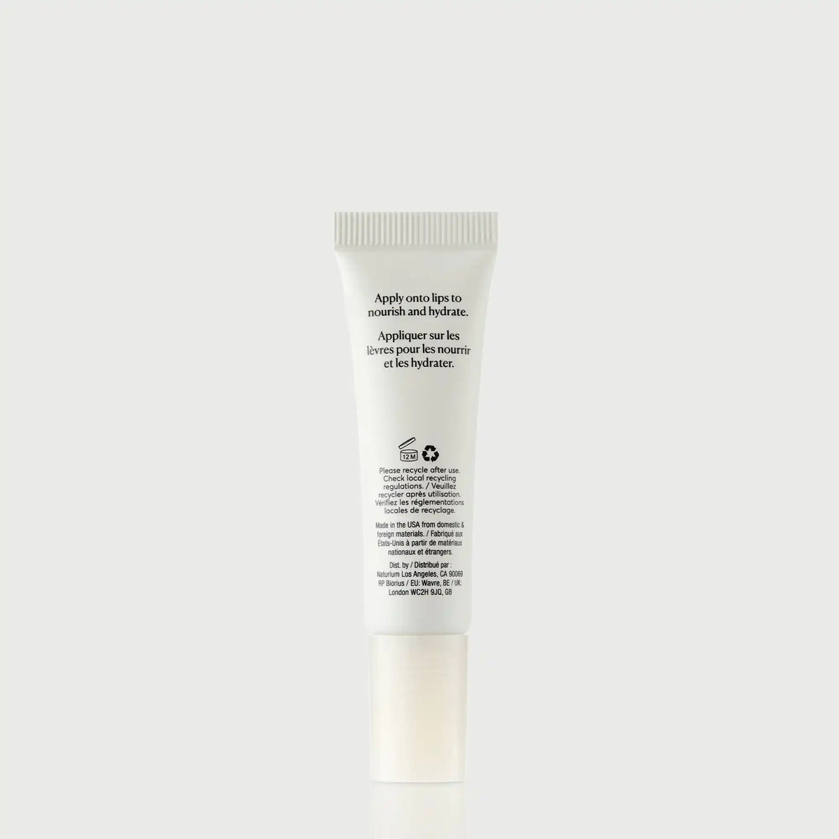 Phyto-Glow Lip Balm — NATR-60066_PhytoGlow_Clear_primary_capon_back-bonebkgd.webp